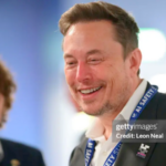 Elon Musk talking during an interview about Twitter