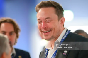 Elon Musk talking during an interview about Twitter