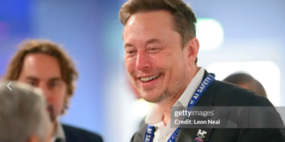 Elon Musk talking during an interview about Twitter